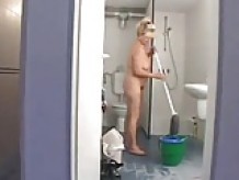 Mature BBW Cleaning Lady Does Two Guys in the Men's Room